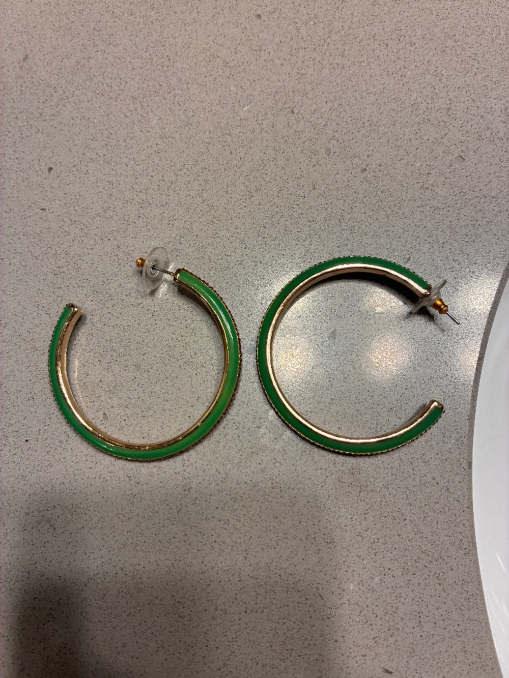 Green hoop earrings